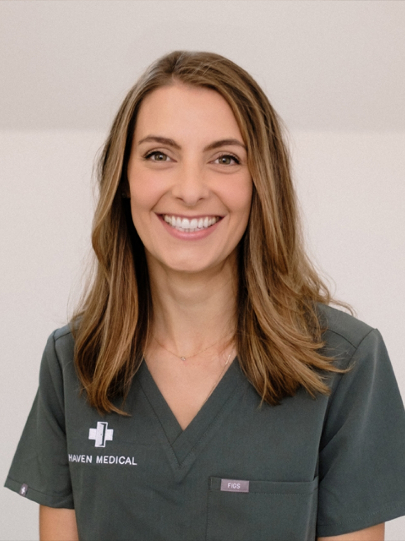 Happy Haven Medical employee in a branded uniform