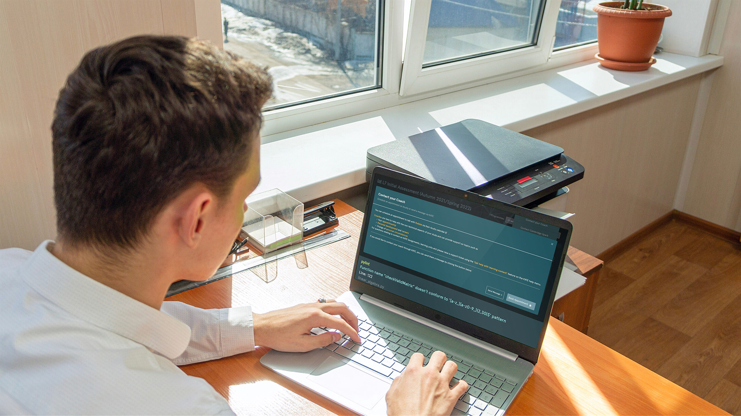 My Cambridge Spark Student studying on a laptop