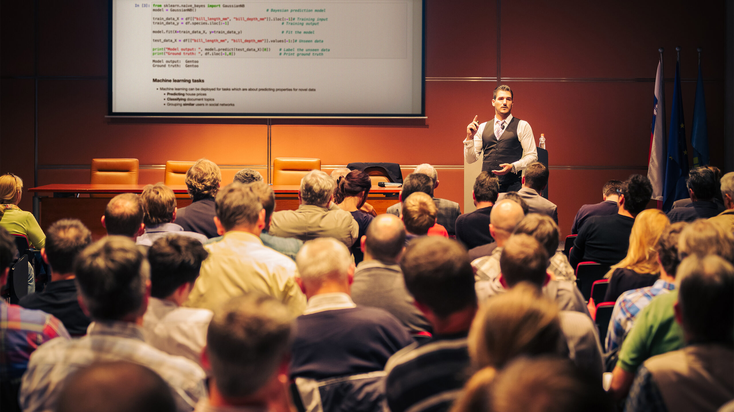Cambridge Spark teacher presenting to an audience