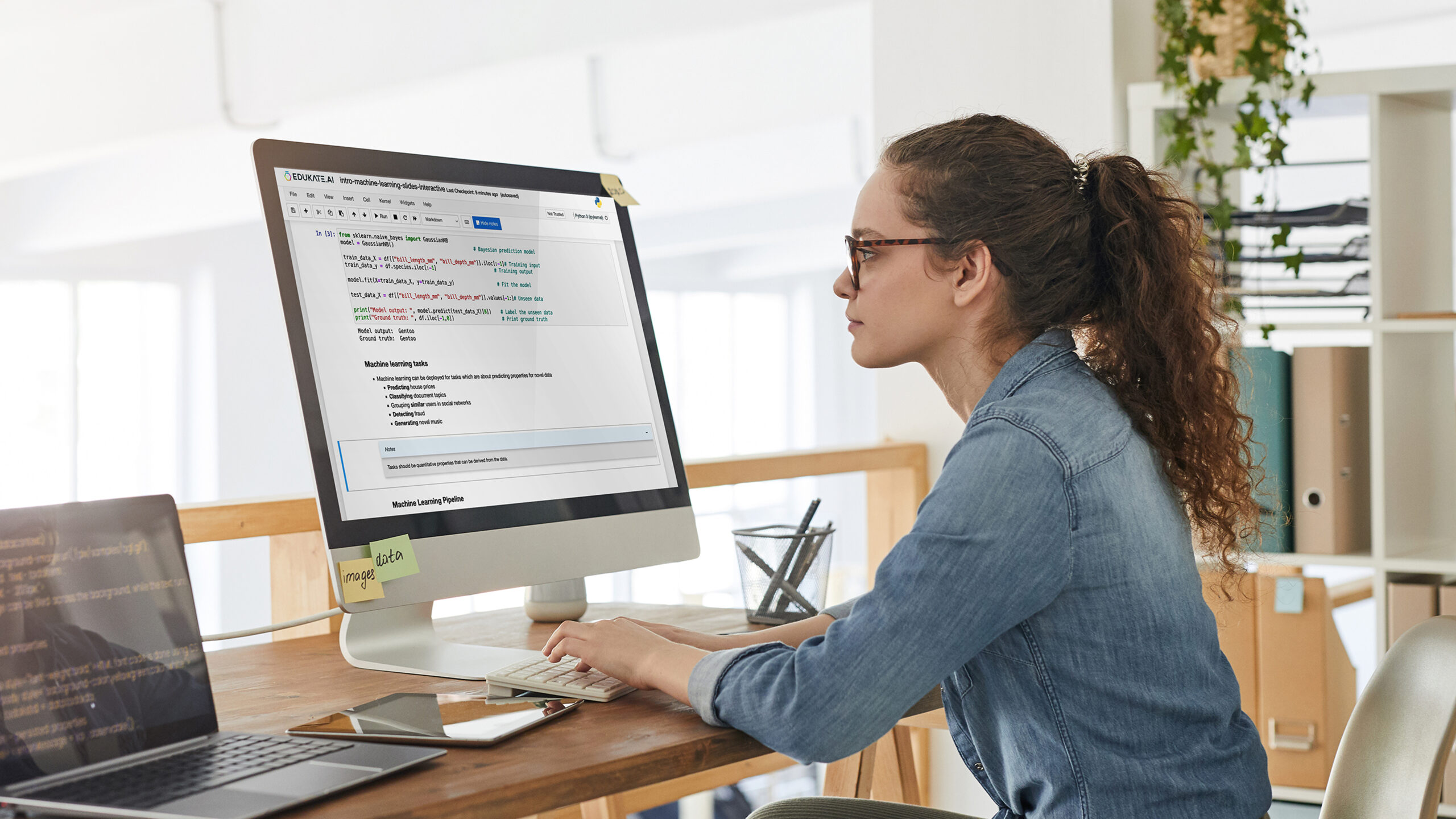 Cambridge Spark student studying at a desktop computer