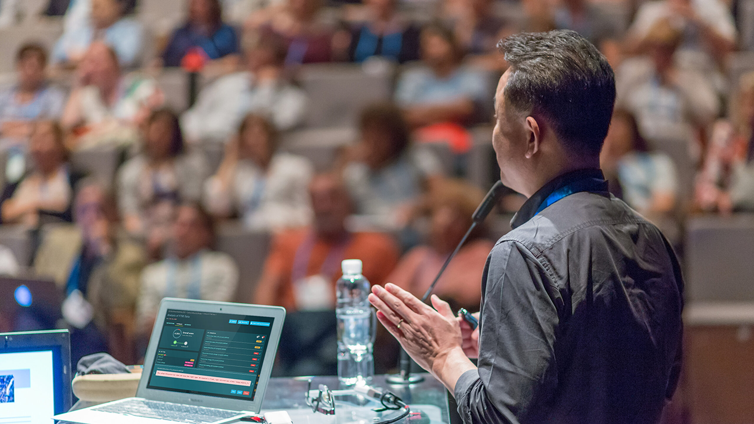 Cambridge Spark teacher presenting to an audience