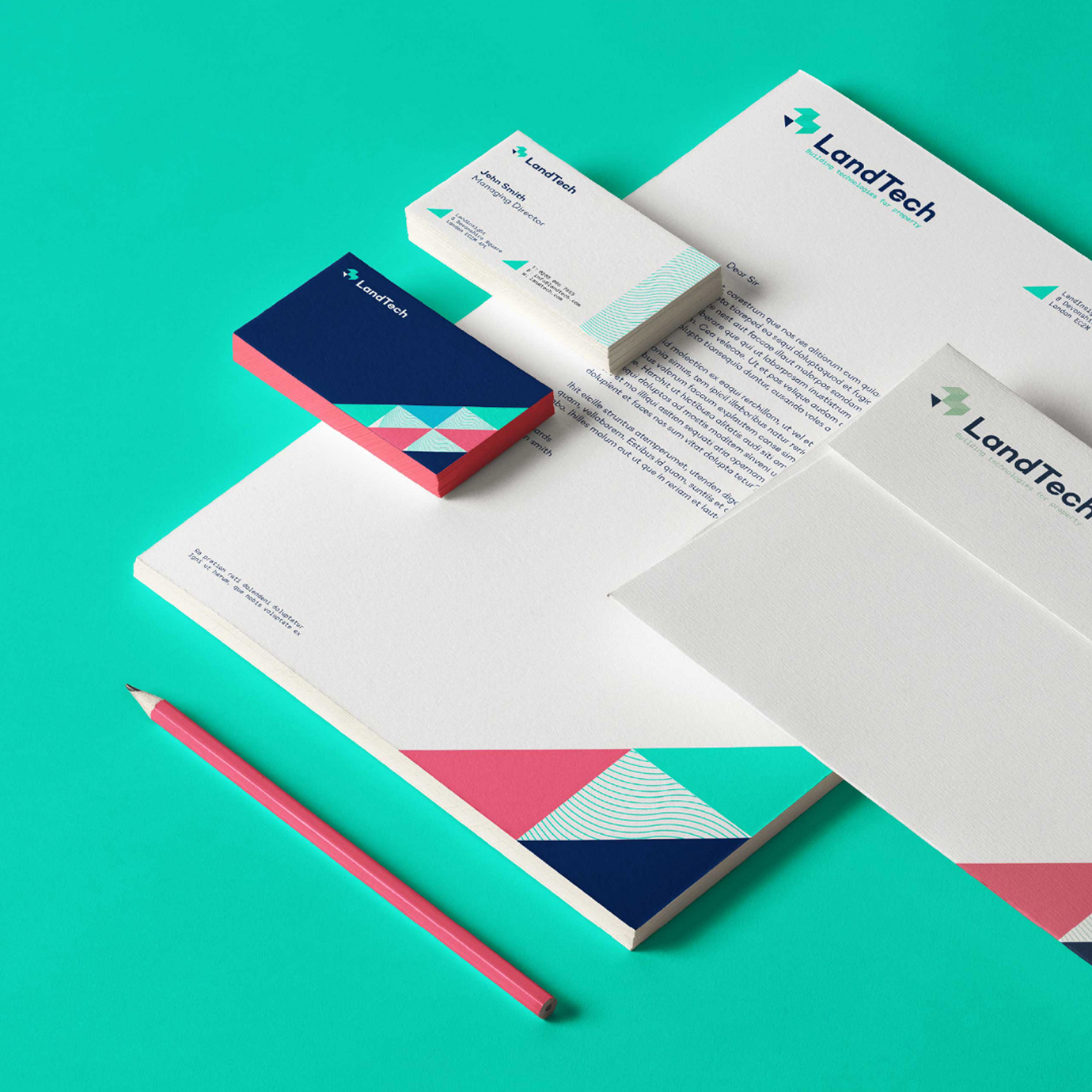 Landtech branded business card letterhead and envelope