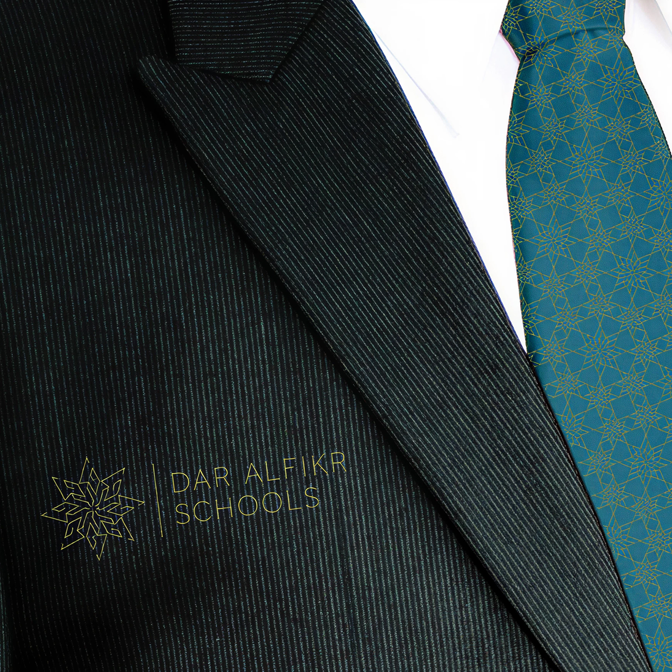 Dar Al Fikr branded suit and tie